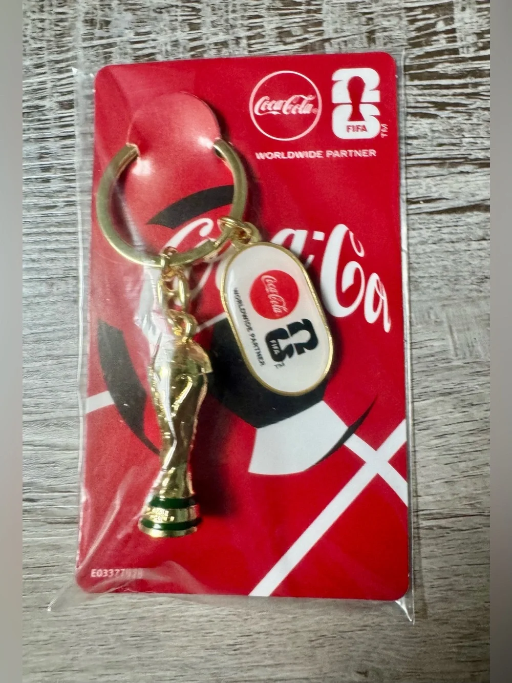 Coca-Cola FIFA World Cup Trophy Tour 2026. This Coca-Cola souvenir keychain,